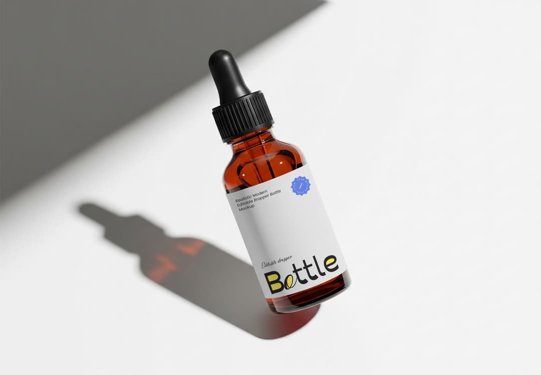 Free Amber Dropper Bottle Mockup for Packaging Branding
