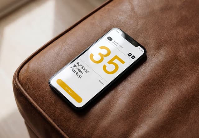 Realistic iPhone Screen Mockup on Leather Surface