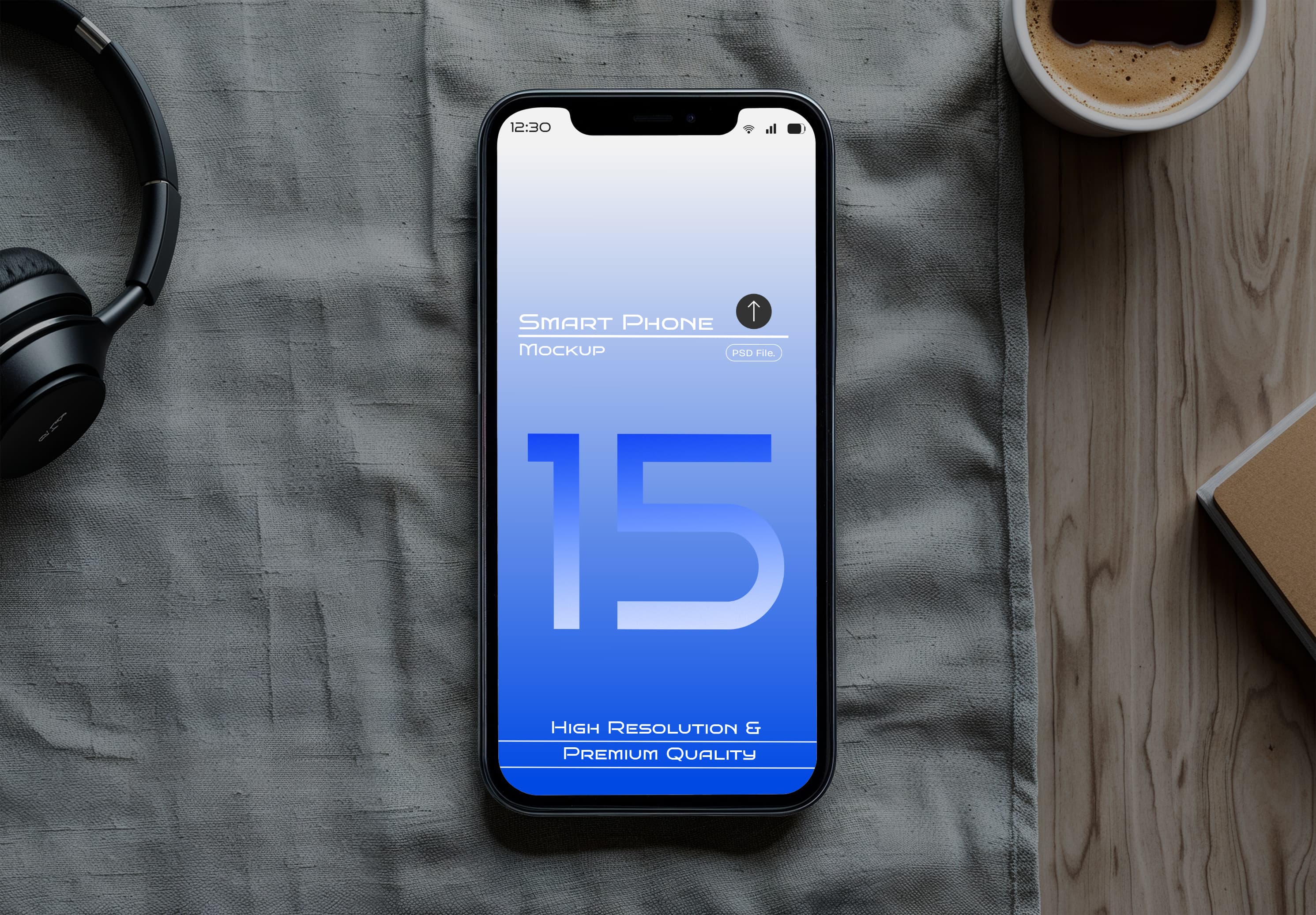 Lifestyle iPhone 15 Mockup – Blue Screen on Desk with Coffee & Headphones