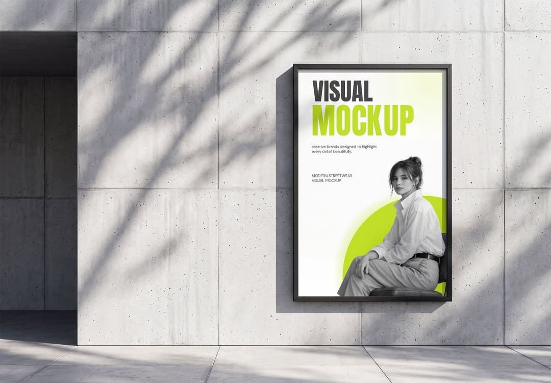 Outdoor Framed Poster Mockup on a Sunlit Concrete Wall