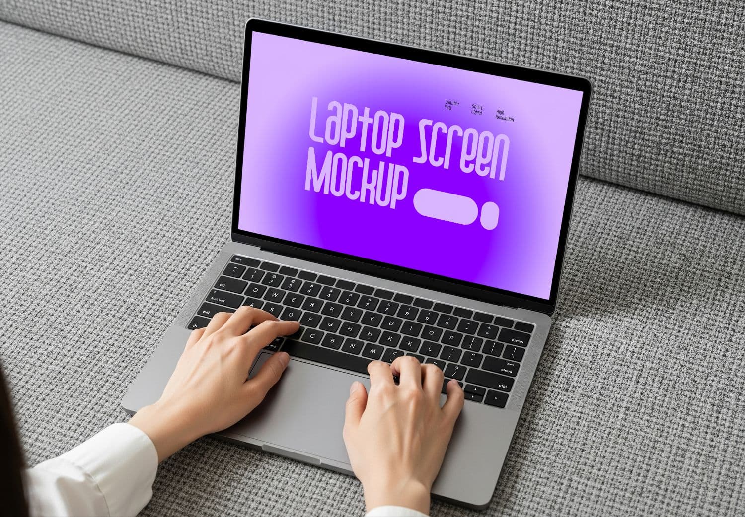 Laptop Screen Mockup on Gray Sofa