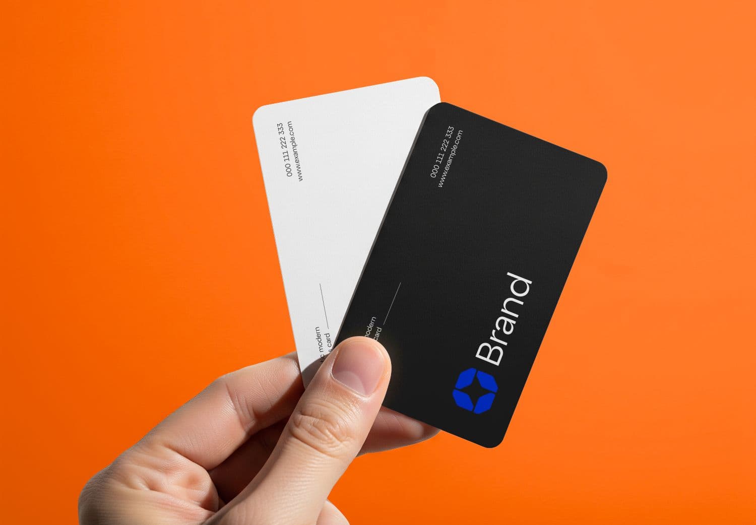 Hand-Held Business Card Mockup in Black & White on Vibrant Orange