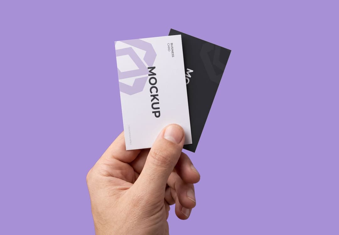 Hand Holding Dual Business Card's Mockup
