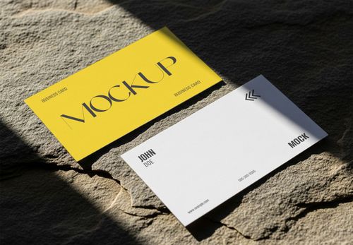 Yellow & White Business Card Mockup - Realistic Stone Surface Presentation